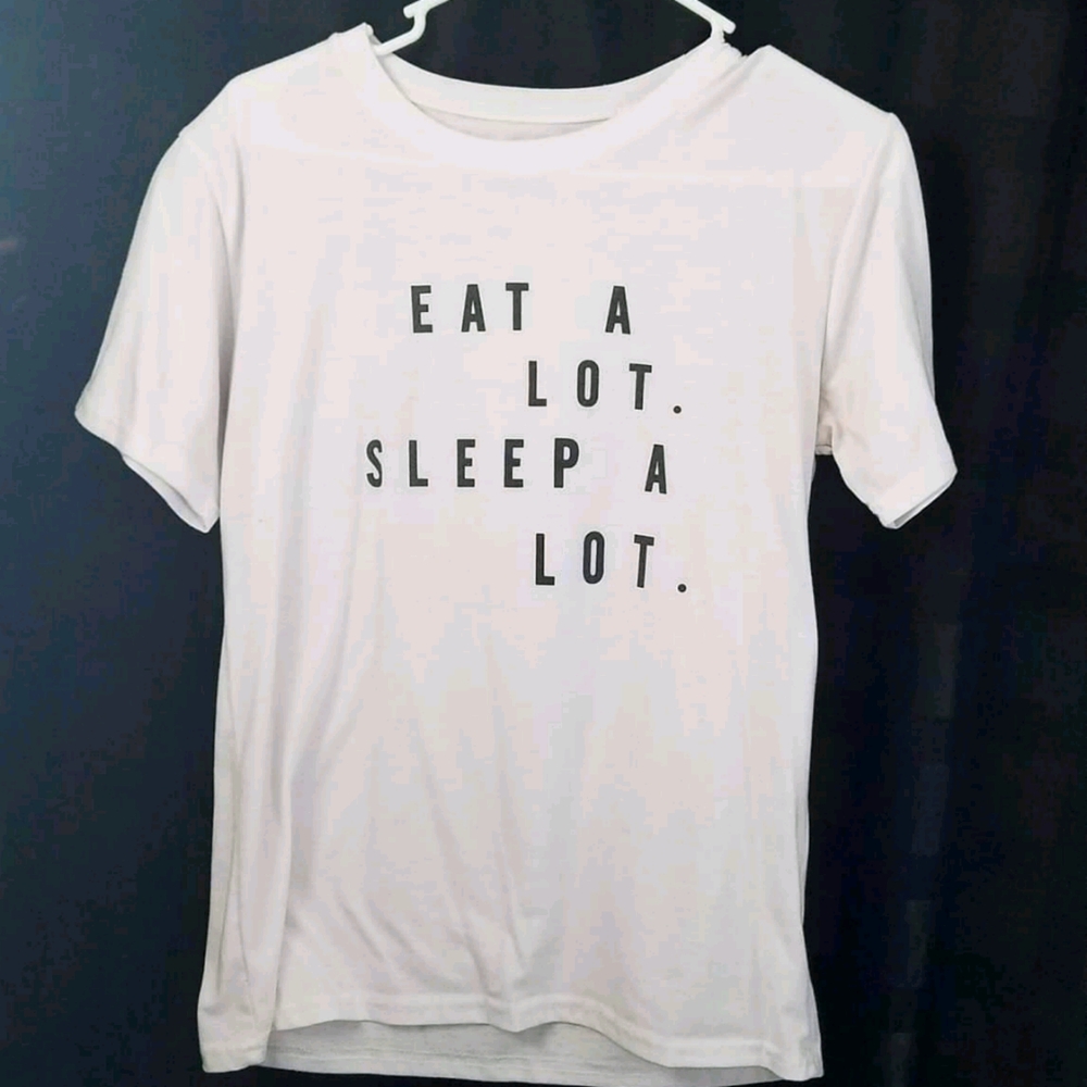 "Eat a lot. Sleep a lot." white tee